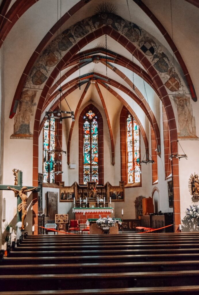 Altar and frescoes inside the Church of Saints Peter and Paul in Eltville