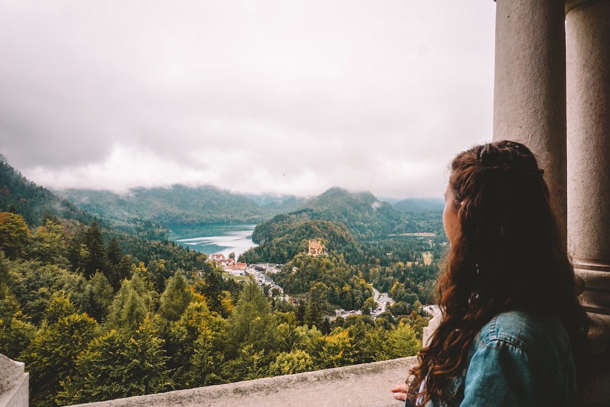 Woman looking out at the town of Schwangau from Neuschwanstein Castle