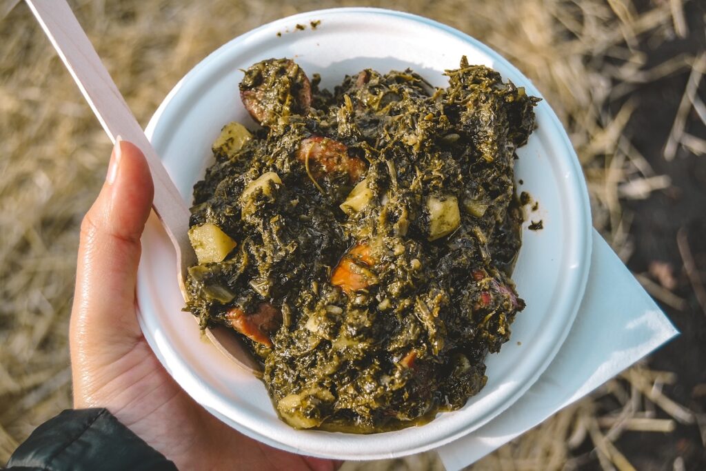 a bowl of Grünkohl with sausage